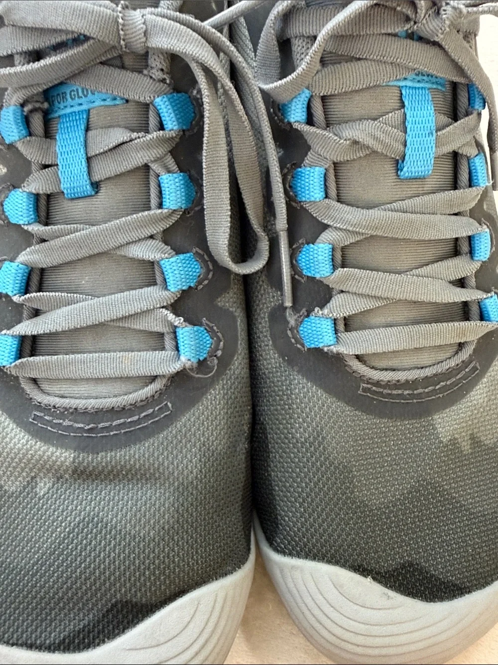 Merrell Barefoot Multi-Gray Camouflage Sneakers with blue accents.